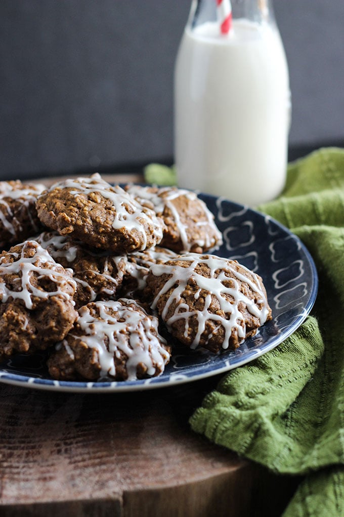 Pumpkin Molasses Cookies stacked on a blue plate.
