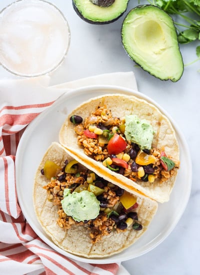Chipotle Tempeh Tacos with Black Bean Salsa and Avocado Crema