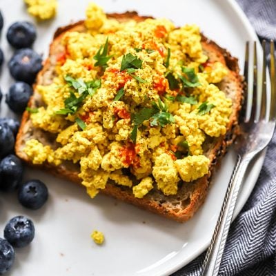 easy vegan tofu scramble on toast with fork