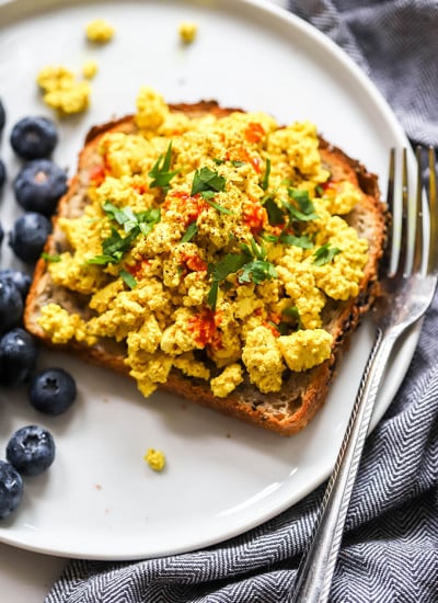 easy vegan tofu scramble on toast with fork