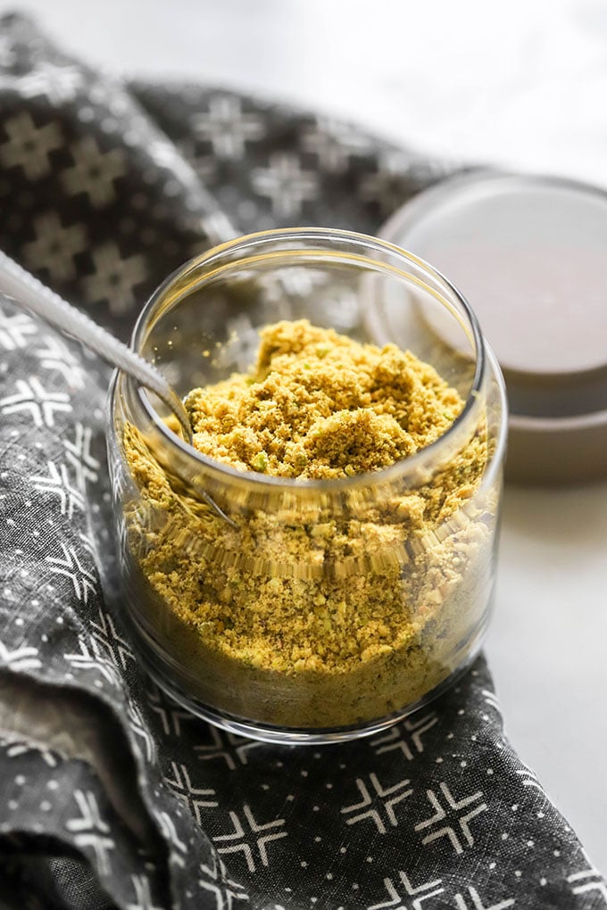 close up of vegan parmesan in jar 