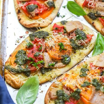 Vegan Tomato and Pesto Naan Pizzas