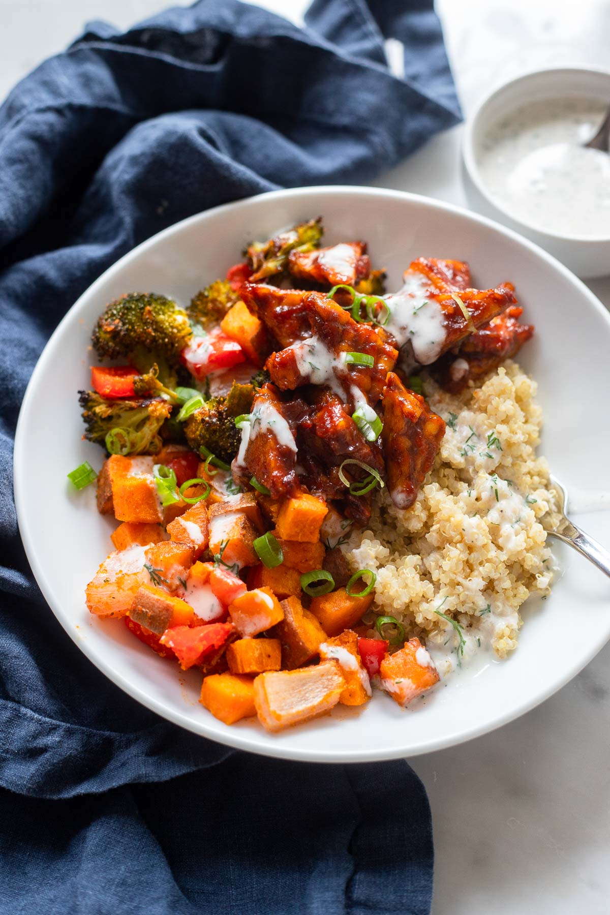 Easy BBQ Tempeh in grain bowl with quinoa and roasted sweet potato