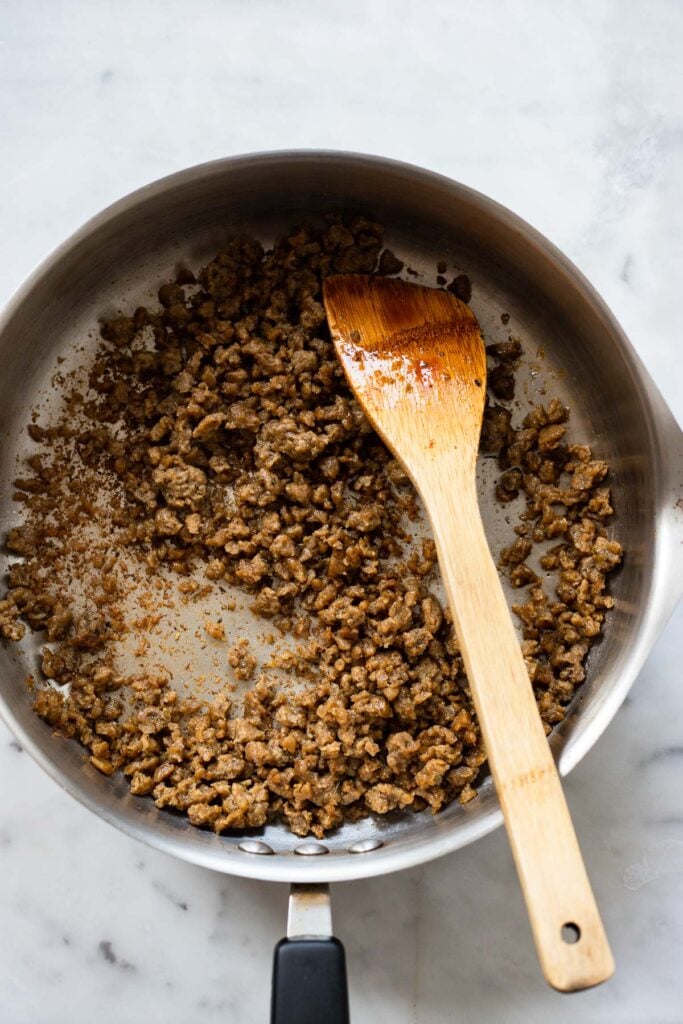 ground seitan in pan with oil. 