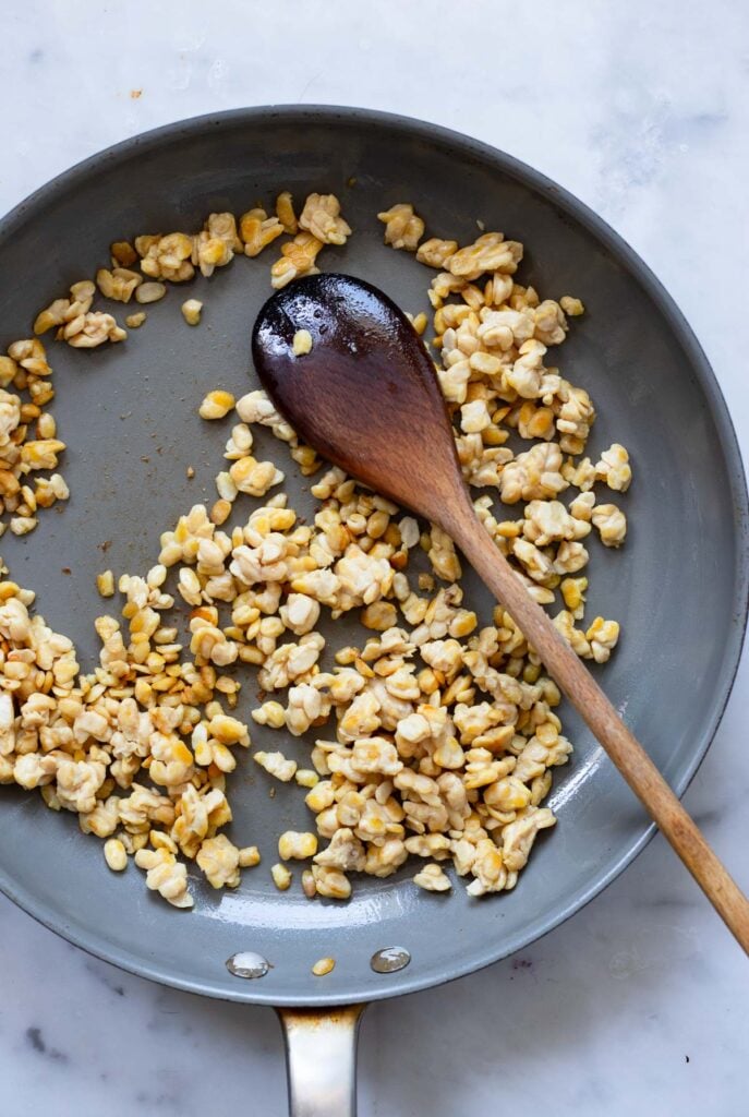 browned tempeh in skillet.