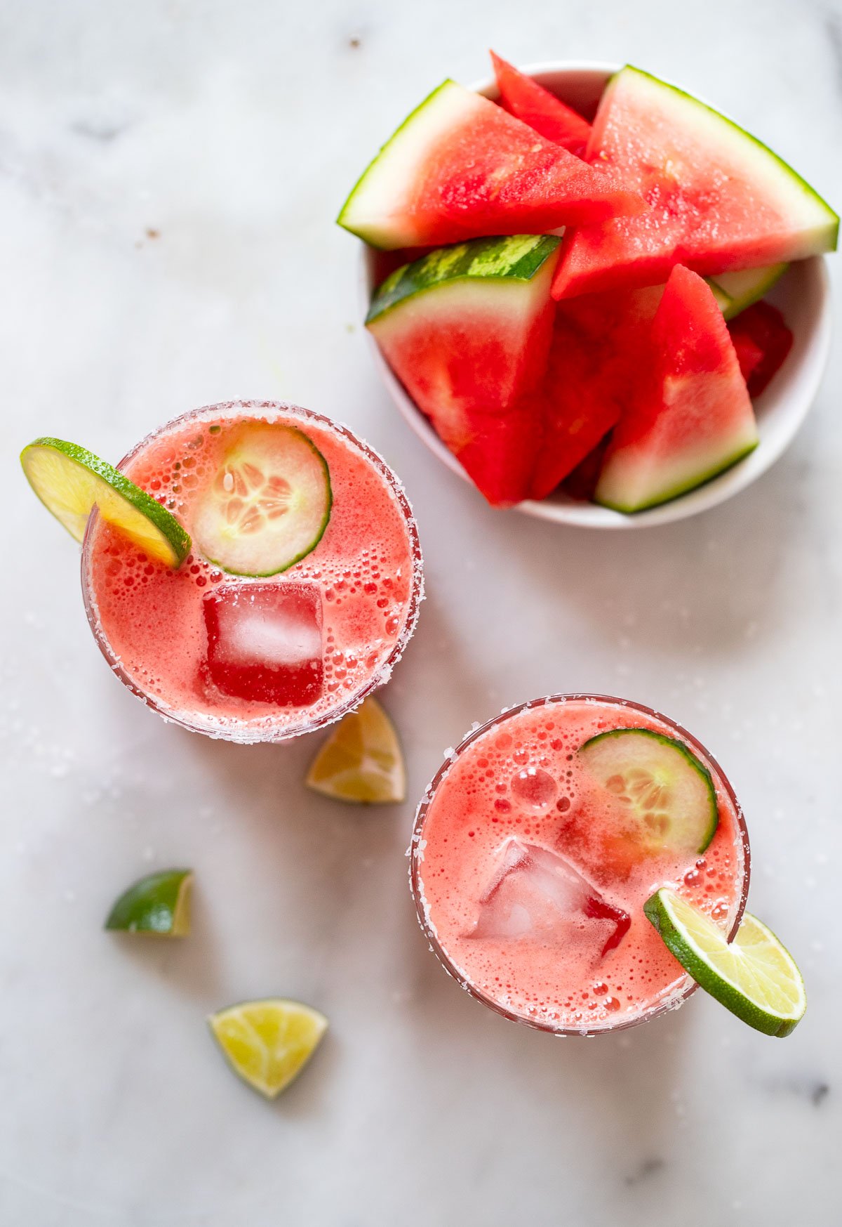 margaritas with bowl of watermelon.