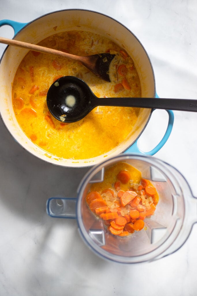 puree the soup in the pot with an immersion blender or transfer to blender to puree.