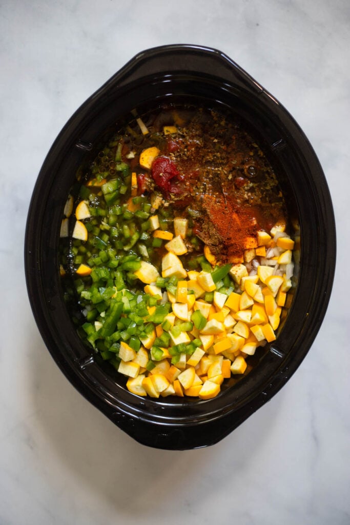 chili ingredients in slow cooker. 