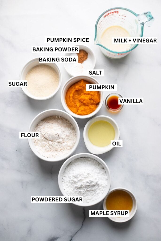 baked pumpkin donuts ingredients in dishes.
