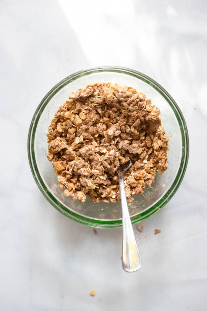 Add crumble ingredients to bowl and combine with a fork or your hands.
