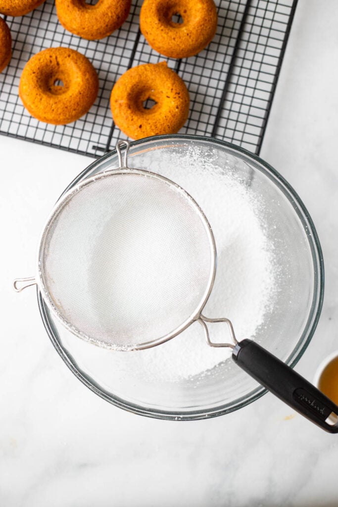 sift the powdered sugar into a large bowl.
