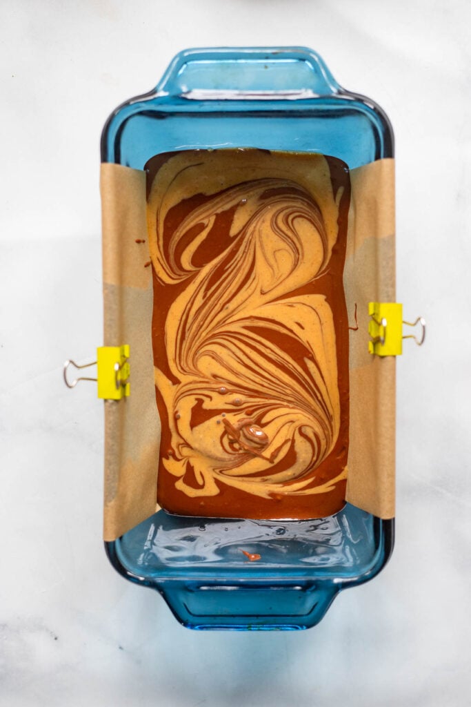 peanut butter fudge with extra melted peanut butter swirled into the top.