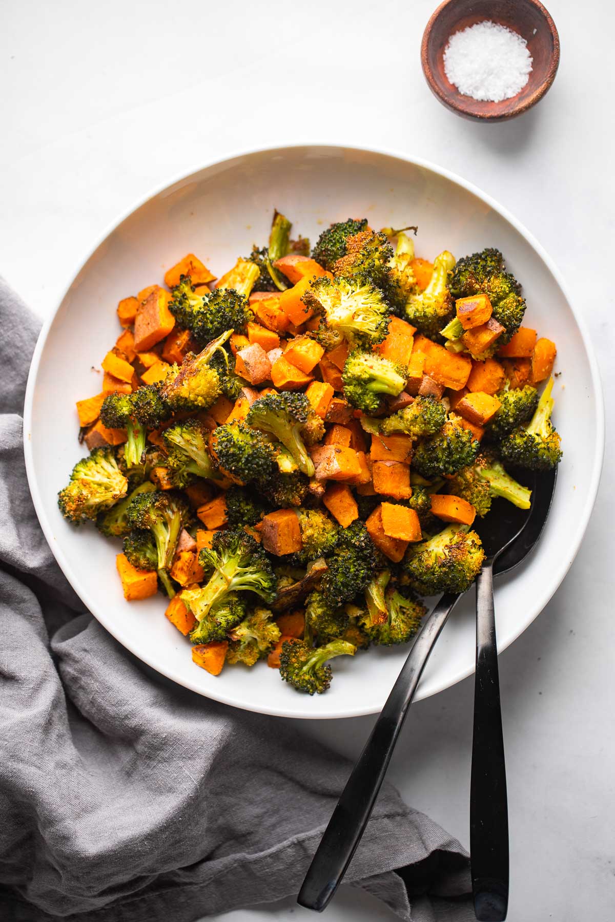roasted broccoli and sweet potatoes in bowl. 