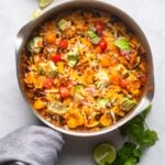 vegetarian black bean skillet enchiladas with napkin on the pan handle.