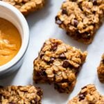 peanut butter banana oatmeal bars on white background.