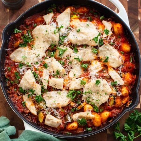 easy gnocchi skillet topped with chopped parsley.