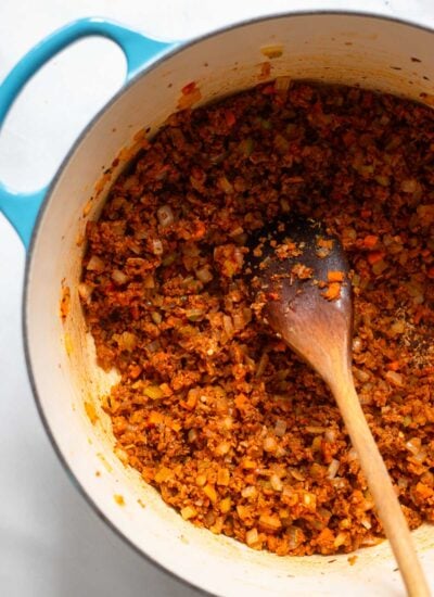 meat and veggies stir fried together in a large dutch oven. 